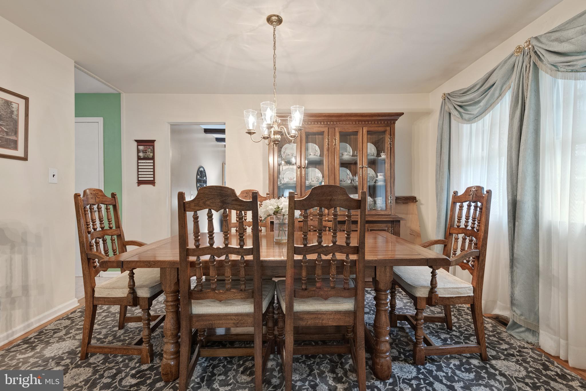 685 Chambers Rock Road Landenberg, PA 19350 - Photo 20 of 49 a view of a dining room with furniture and chandelier