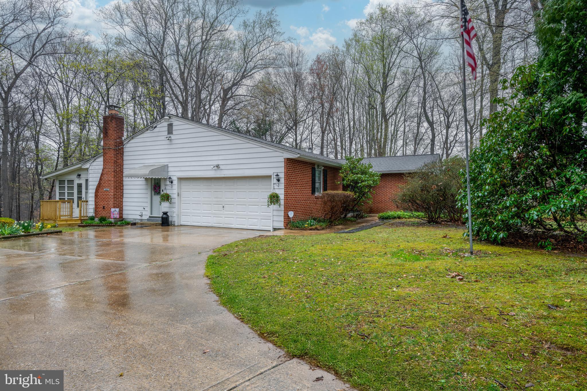 685 Chambers Rock Road Landenberg, PA 19350 - Photo 2 of 49 a front view of a house with garden