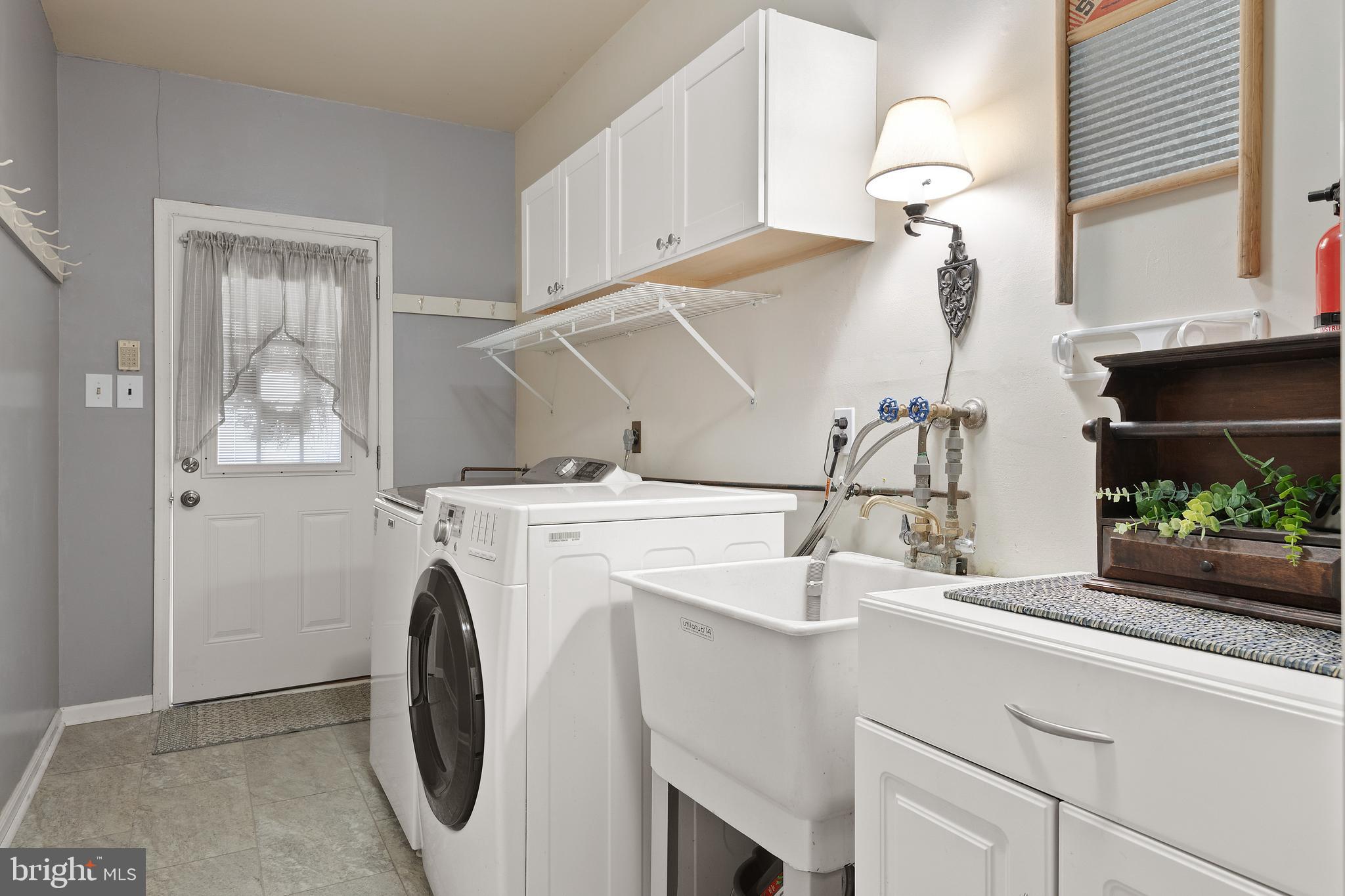 685 Chambers Rock Road Landenberg, PA 19350 - Photo 24 of 49 a room with a washing machine and a sink