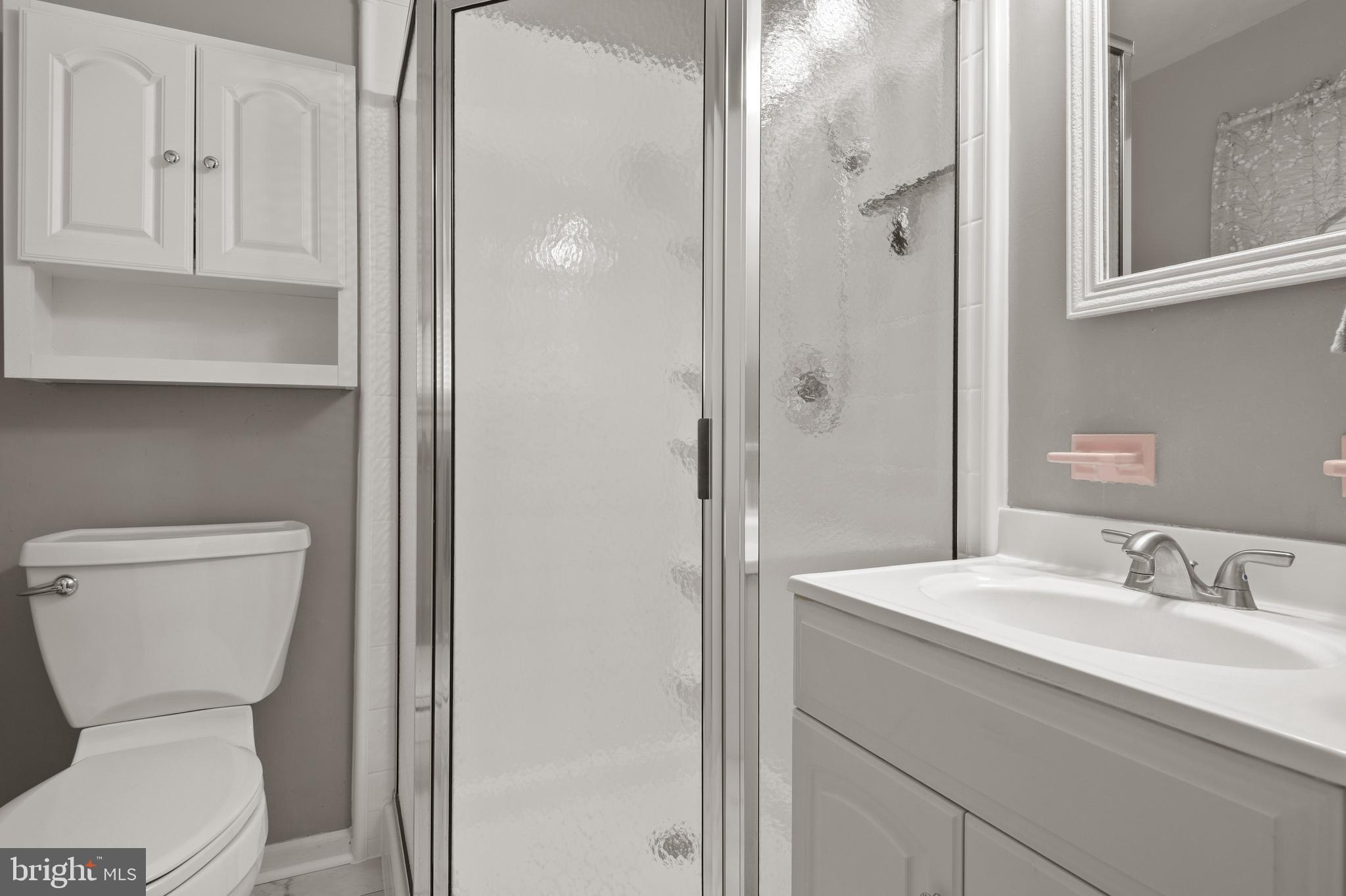 685 Chambers Rock Road Landenberg, PA 19350 - Photo 32 of 49 a bathroom with a toilet sink and shower