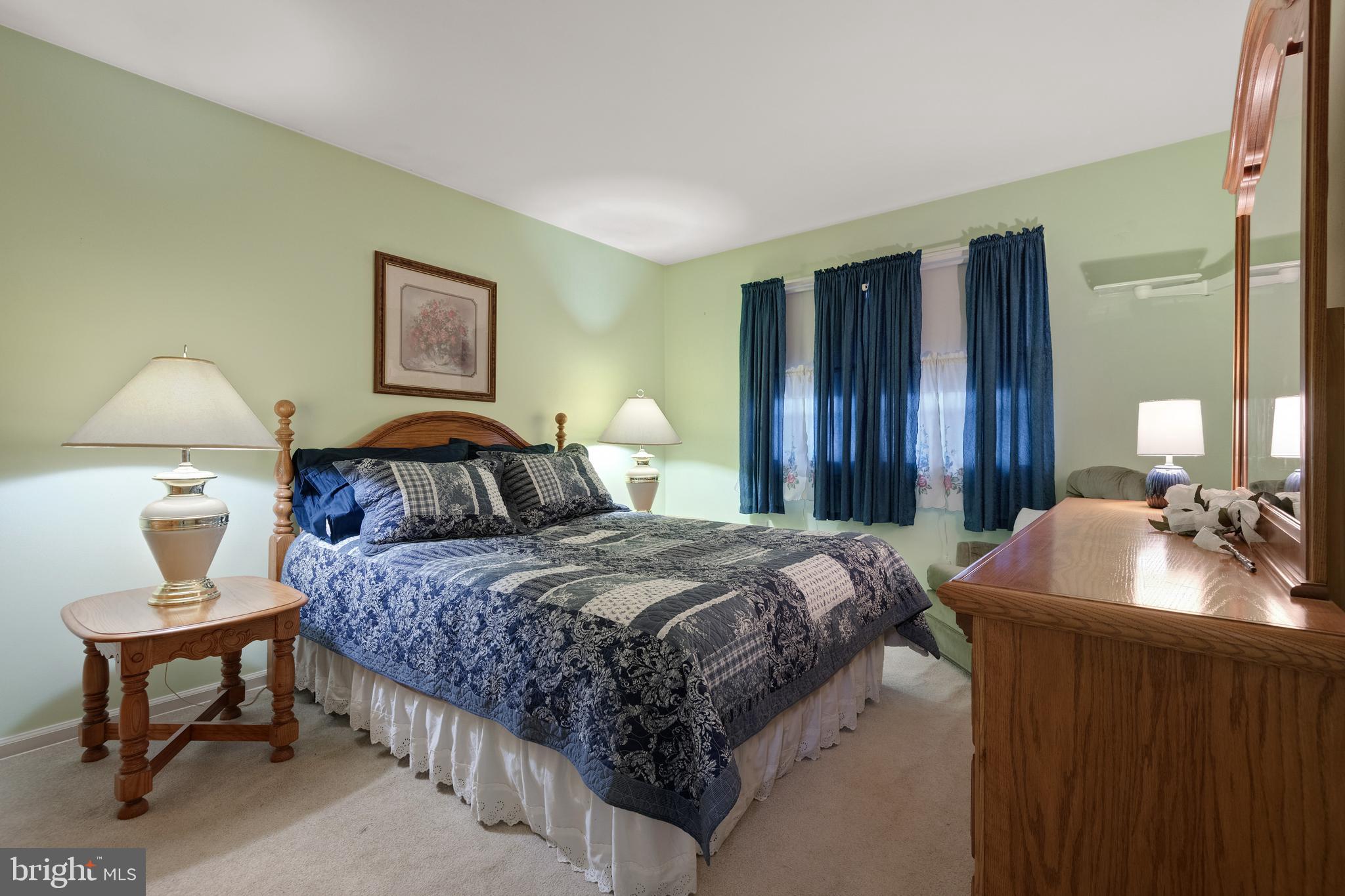 685 Chambers Rock Road Landenberg, PA 19350 - Photo 33 of 49 a bedroom with a bed and a table