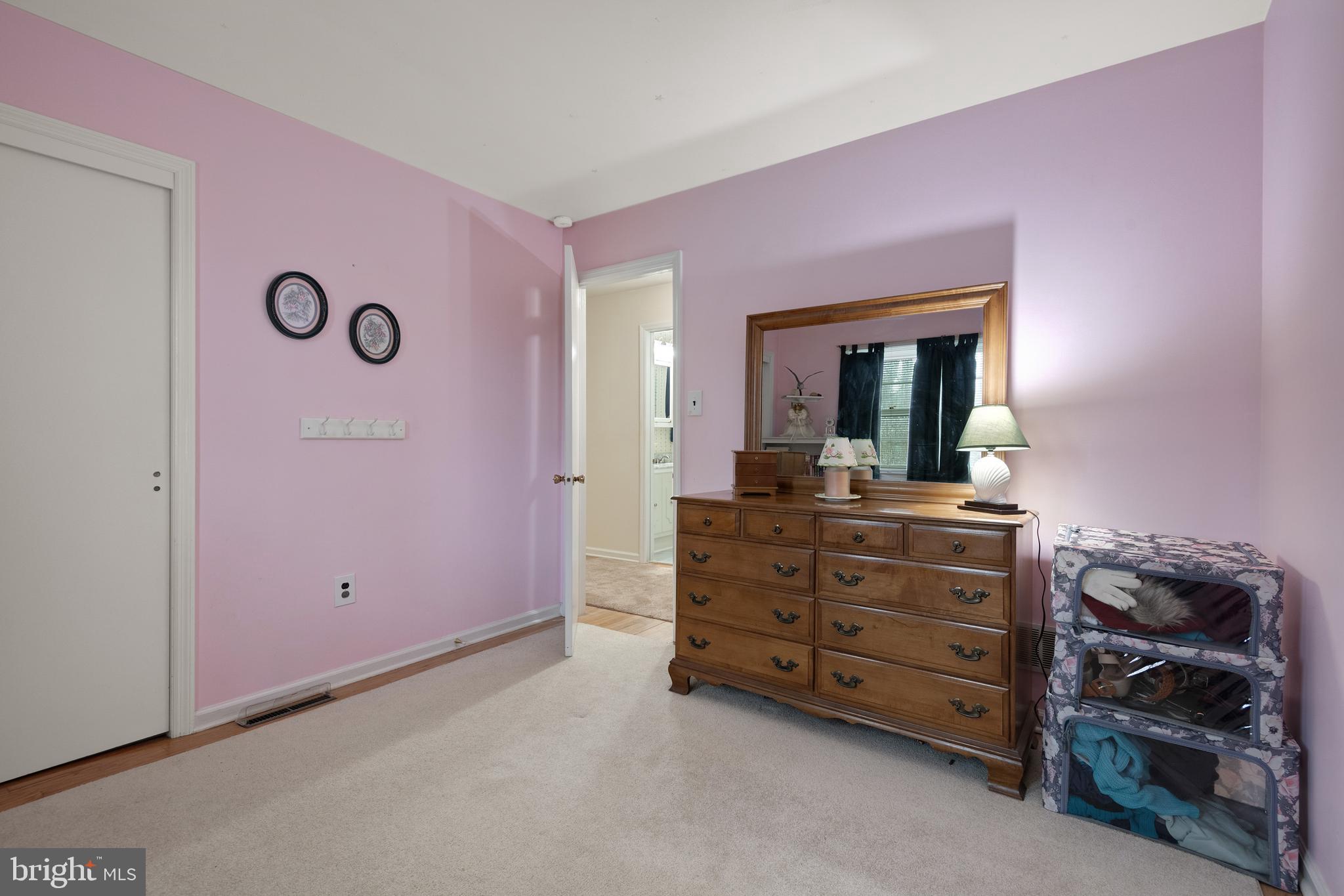 685 Chambers Rock Road Landenberg, PA 19350 - Photo 36 of 49 a room with a dresser and a mirror