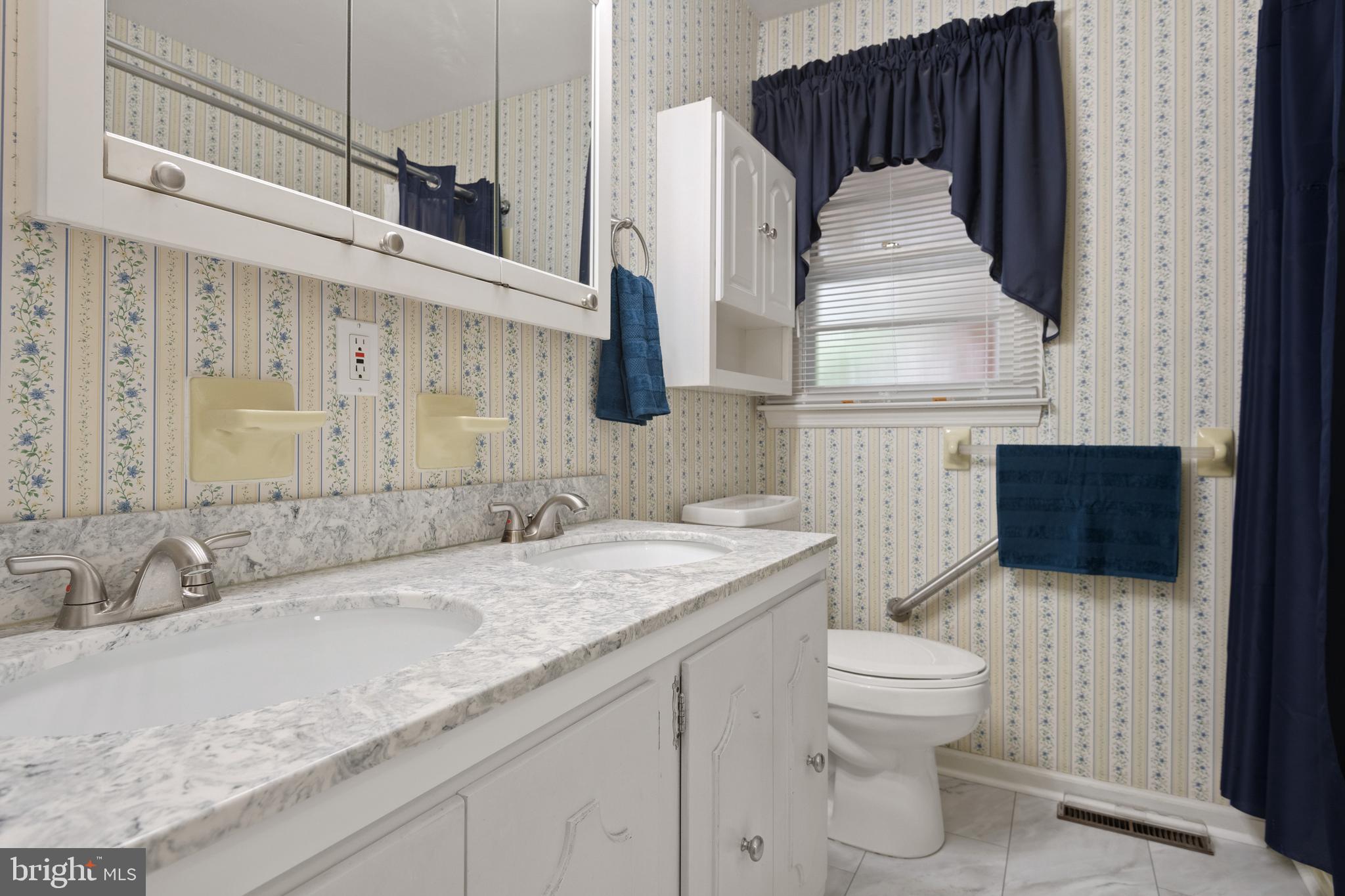 685 Chambers Rock Road Landenberg, PA 19350 - Photo 39 of 49 a bathroom with a sink and mirror