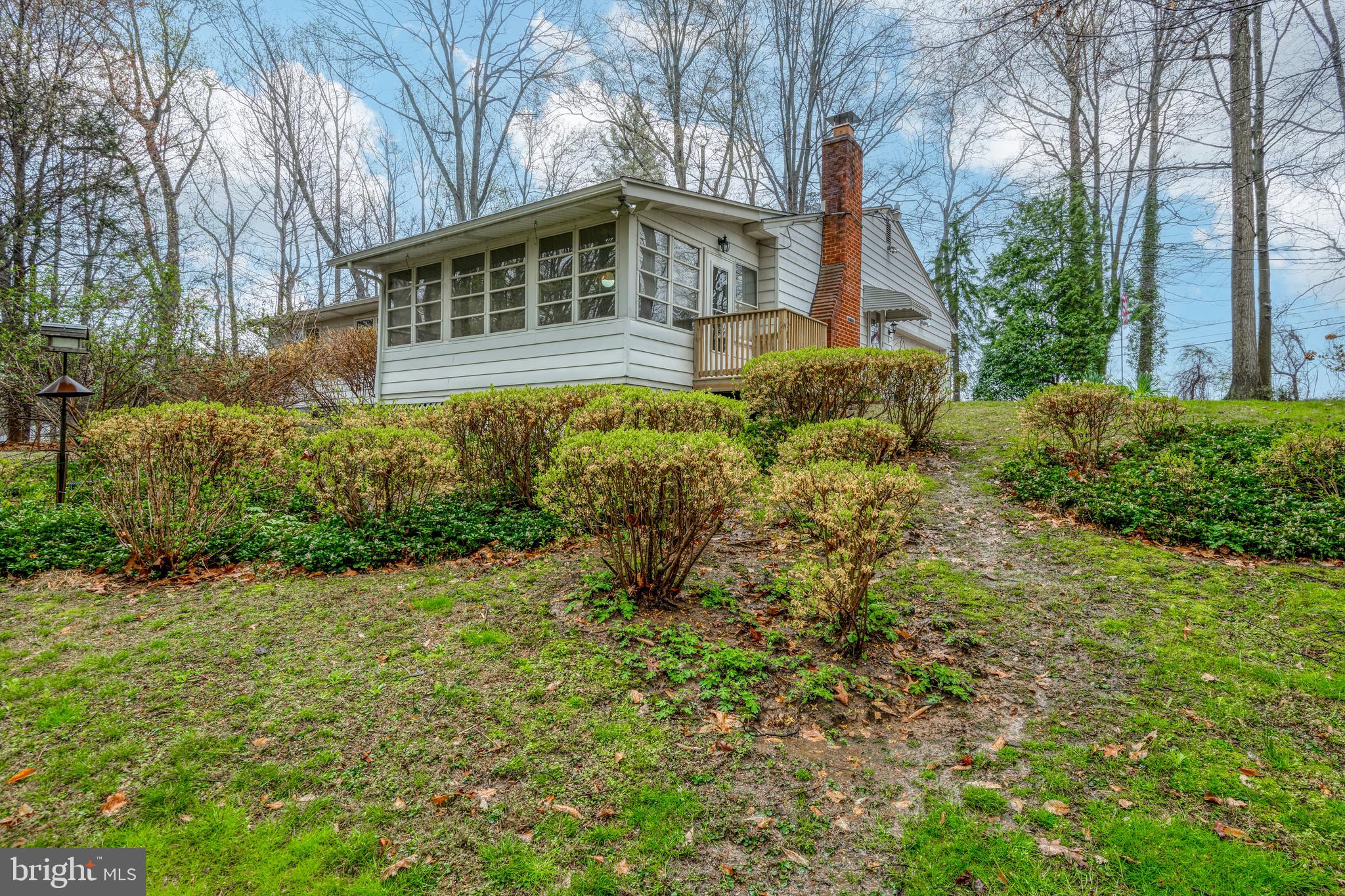 685 Chambers Rock Road Landenberg, PA 19350 - Photo 45 of 49 a front view of a house with a yard and trees