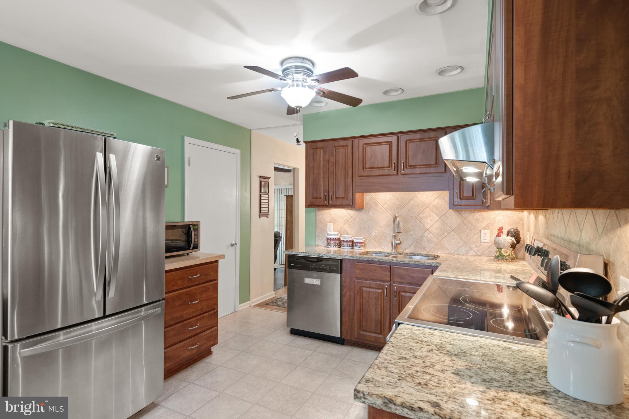685 Chambers Rock Road Landenberg, PA 19350 - Photo 6 of 49 a kitchen with a sink appliances and cabinets