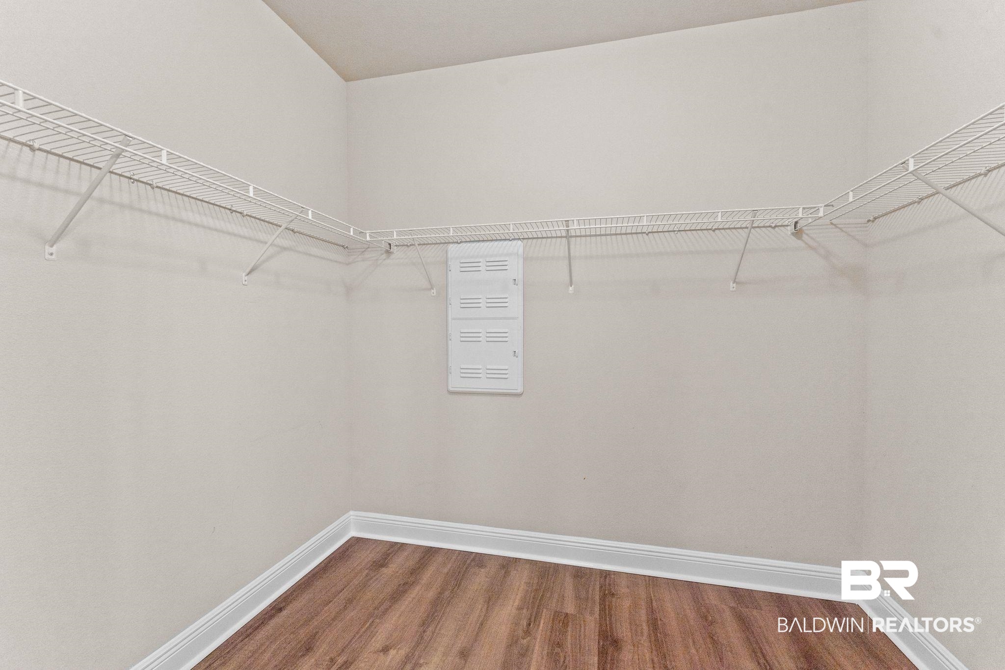 1464 Surrey Loop Foley, AL 36535 - Photo 21 of 24 Walk in closet with wood finished floors