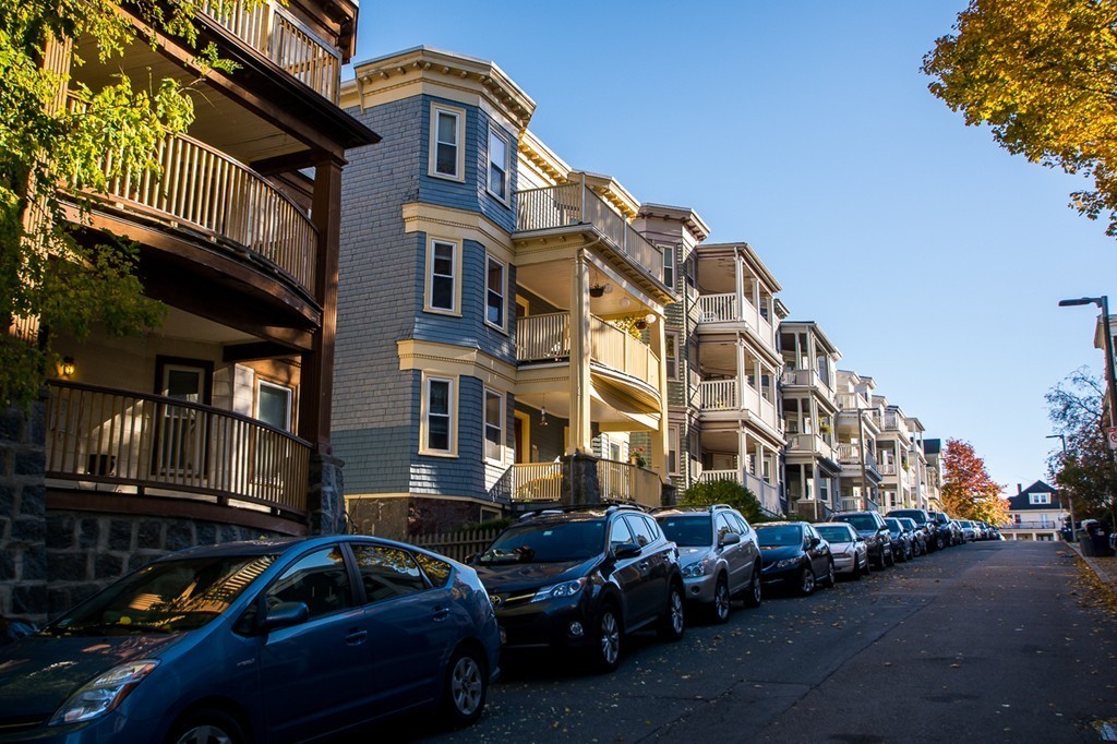 69 Parkton Road, Unit 1 Boston, MA 02130 - Photo 20 of 30 a couple of cars parked in front of a building