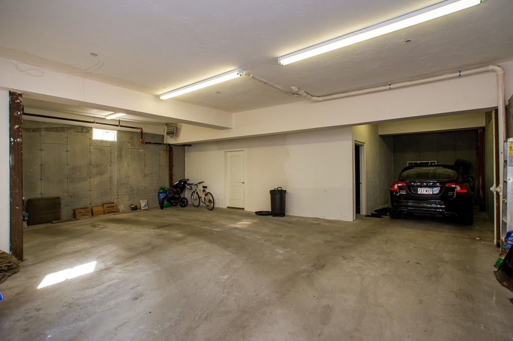 69 Parkton Road, Unit 1 Boston, MA 02130 - Photo 23 of 30 a view of a car garage