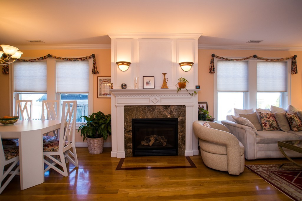 69 Parkton Road, Unit 1 Boston, MA 02130 - Photo 4 of 30 a living room with furniture and a fireplace