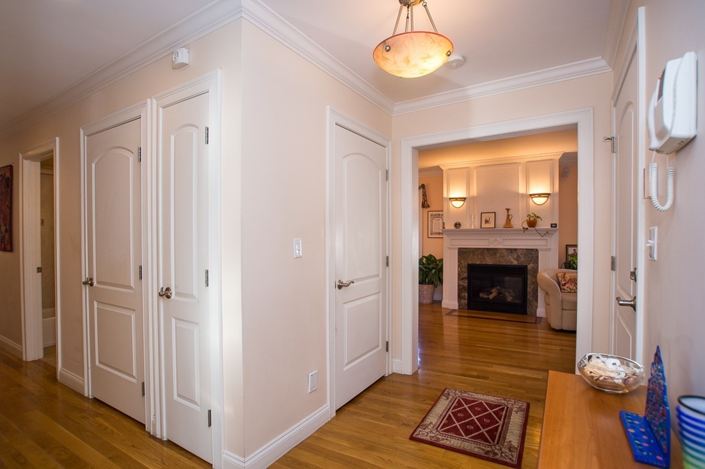 69 Parkton Road, Unit 1 Boston, MA 02130 - Photo 10 of 30 a view of livingroom with furniture and fireplace