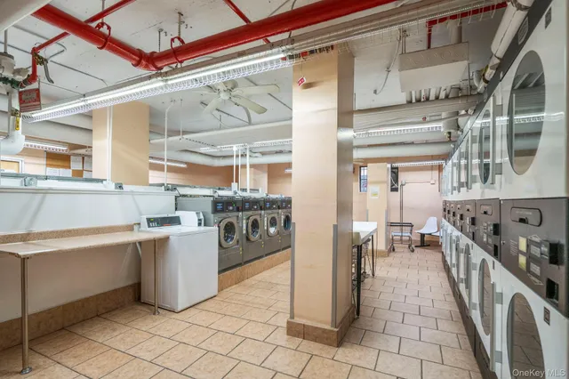 a view of a kitchen with furniture and a window