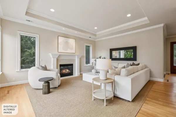 a kitchen with stainless steel appliances granite countertop a sink a stove and a wooden cabinets