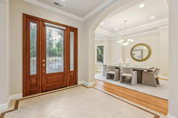 a view of a dining room with furniture window and outside view