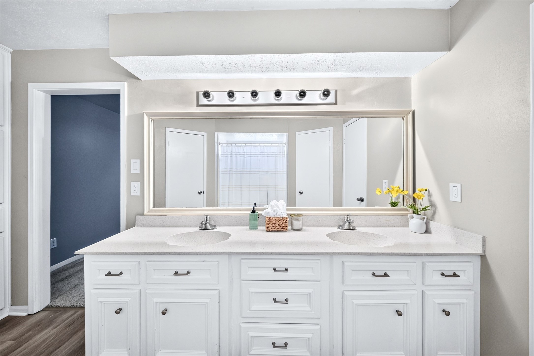 6507 Spring Leaf Drive Spring, TX 77379 - Photo 22 of 50 Spacious primary bath with dual sink vanity, expansive framed mirror, abundant cabinet storage, and a generous countertop space for added convenience.
