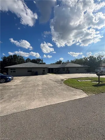 a view of a terrace with a big yard
