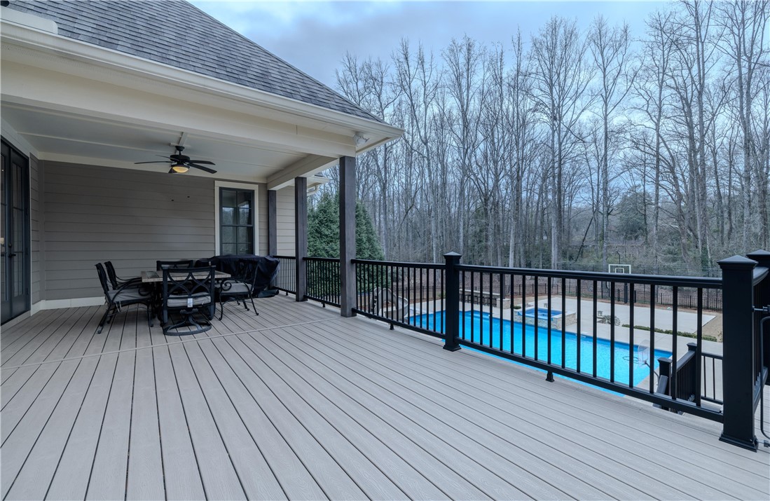 301 Stonebridge Drive Clemson, SC 29631 - Photo 17 of 47 This outdoor deck features ample space for entertaining with views of the refreshing pool.