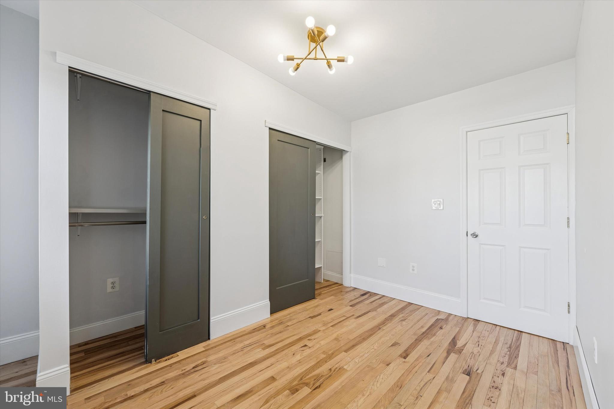2814 West Stiles Street Philadelphia, PA 19121 - Photo 21 of 34 a view of empty room with wooden floor