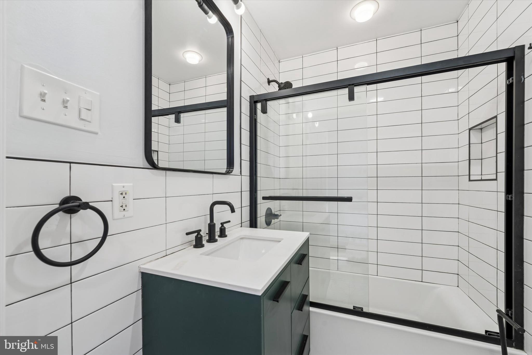 2814 West Stiles Street Philadelphia, PA 19121 - Photo 22 of 34 a bathroom with a sink a toilet and shower