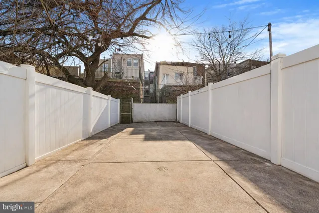 a view of a back yard of the house