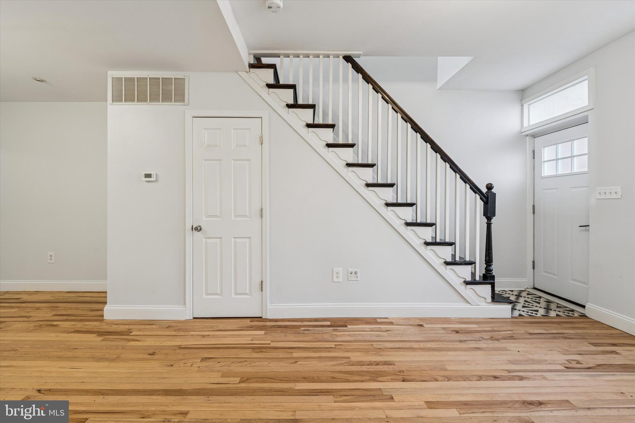 2814 West Stiles Street Philadelphia, PA 19121 - Photo 5 of 34 a view of entryway and hall with wooden floor