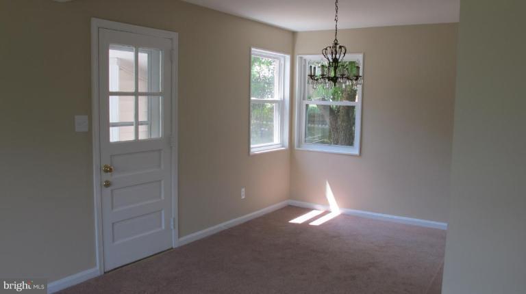 6703 Cabin John Road Springfield, VA 22150 - Photo 2 of 10 a room that has a window in it