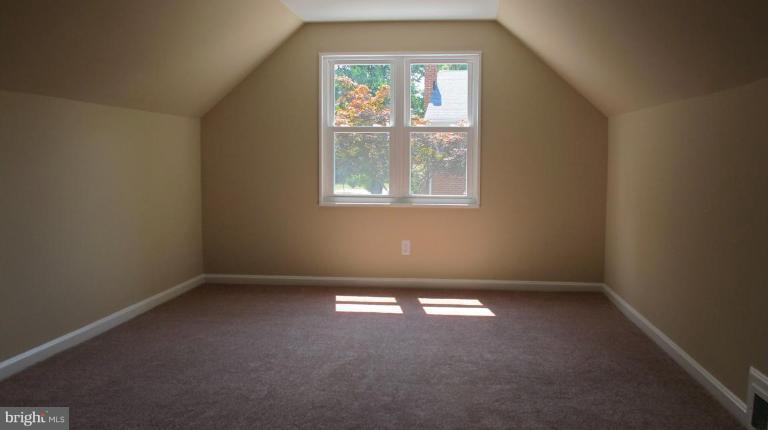 6703 Cabin John Road Springfield, VA 22150 - Photo 9 of 10 an empty room with windows
