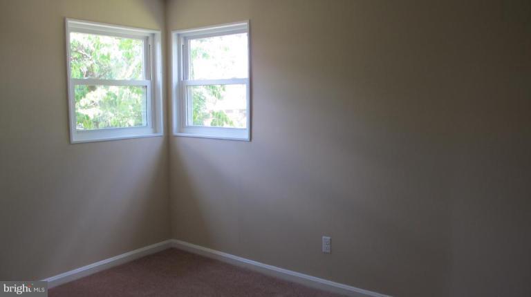 6703 Cabin John Road Springfield, VA 22150 - Photo 10 of 10 an empty room with a window