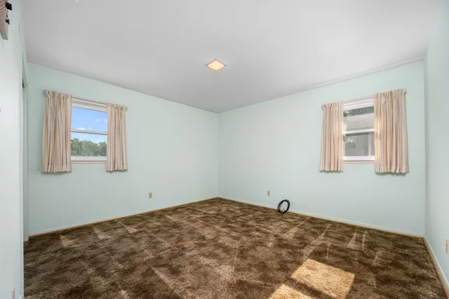 a bathroom with a sink and a large mirror