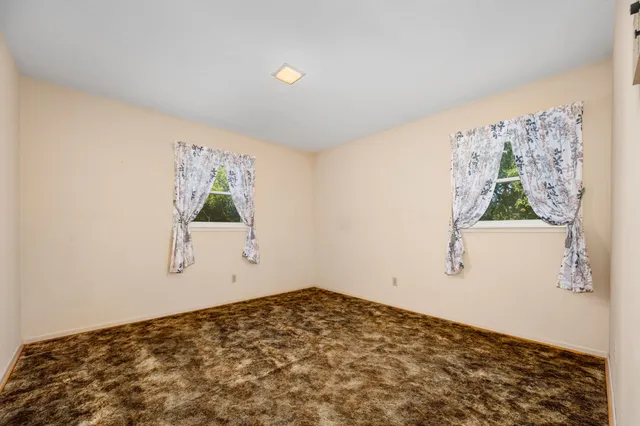 a view of a room with a window