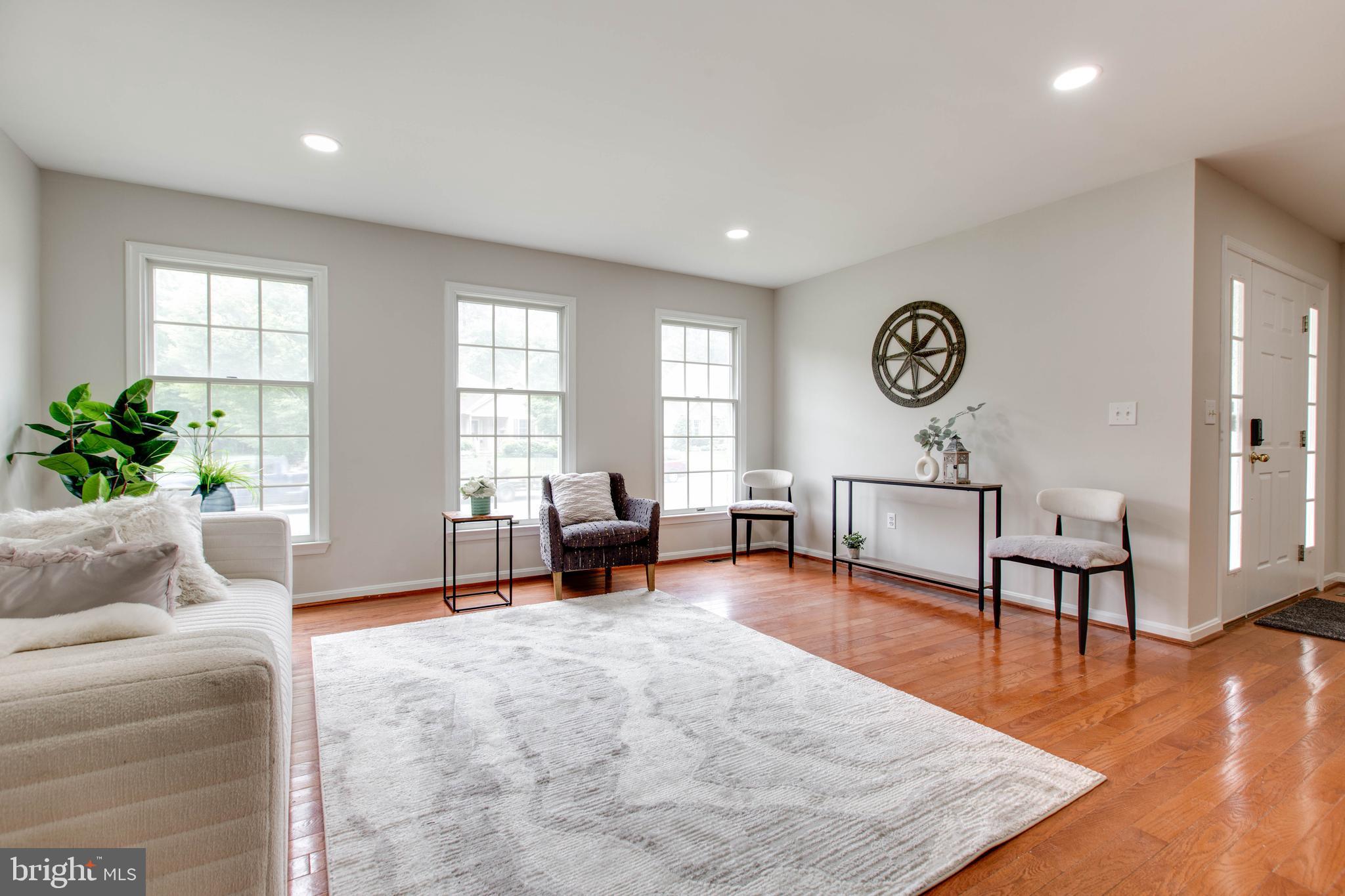 574 Pasture Brook Road Severn, MD 21144 - Photo 15 of 76 a living room with furniture and a large window