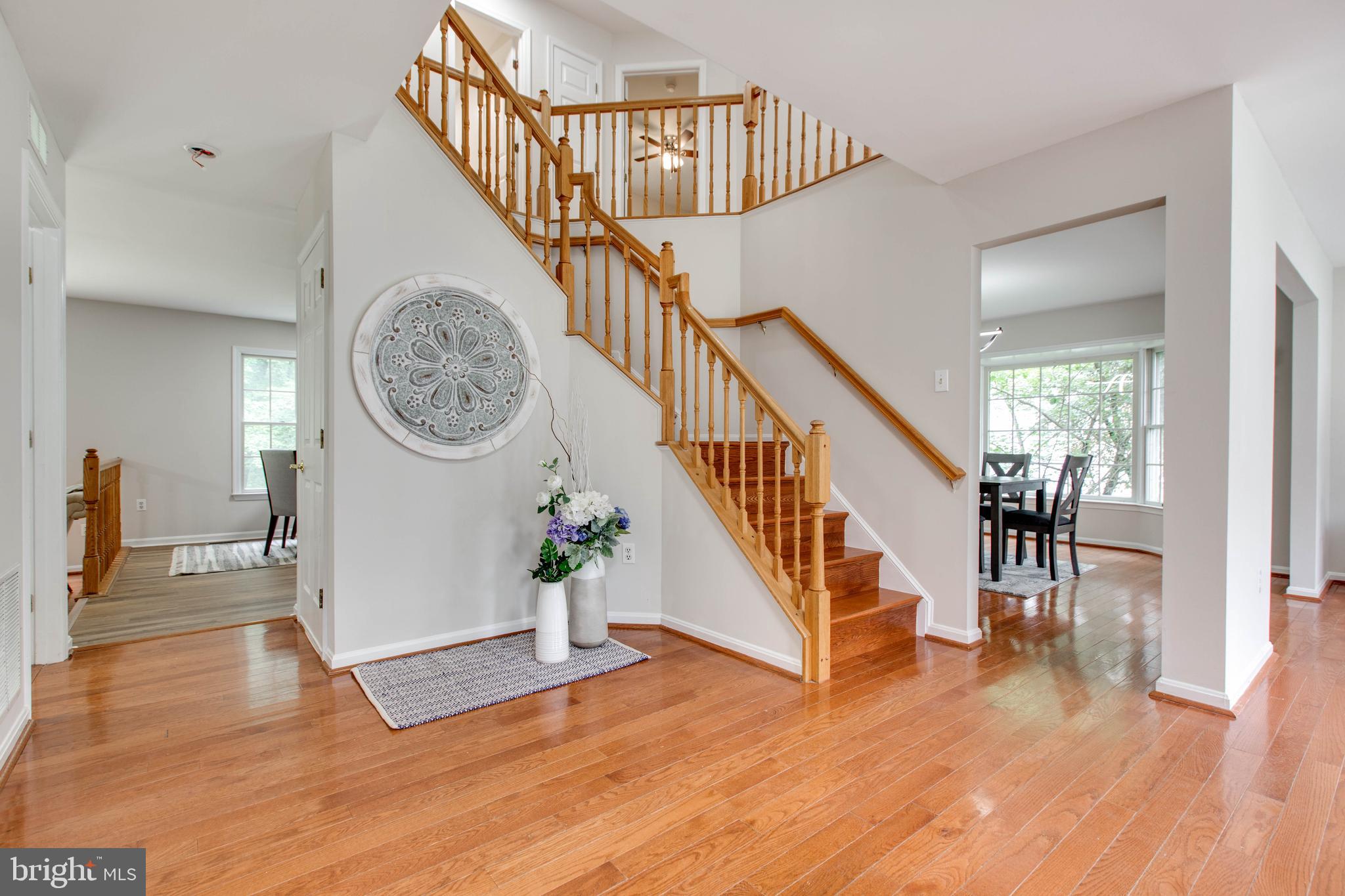 574 Pasture Brook Road Severn, MD 21144 - Photo 8 of 76 a view of entryway and hall with wooden floor