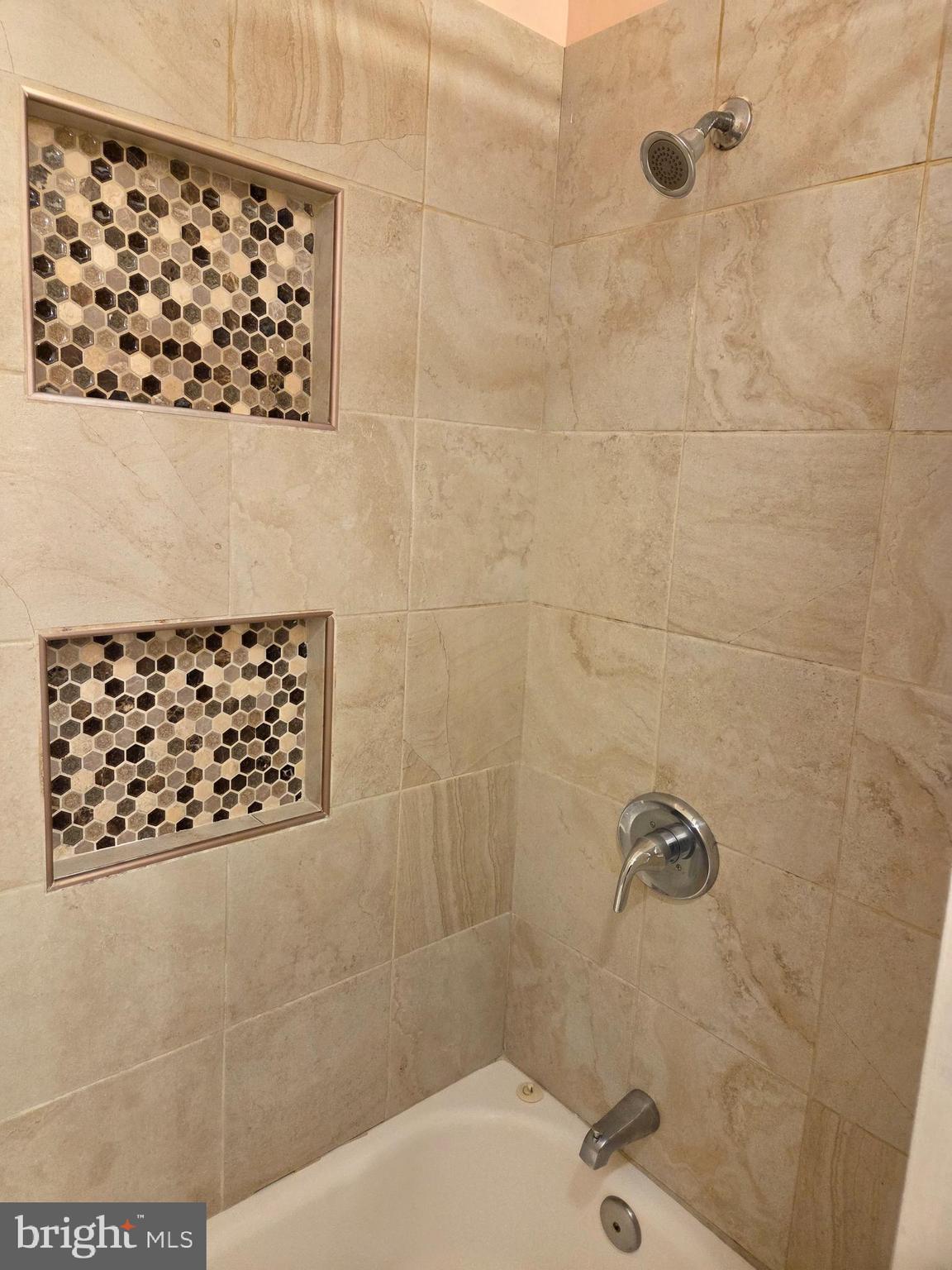 561 Homestead Road, Unit A Wilmington, DE 19805 - Photo 9 of 11 a bathroom with a shower