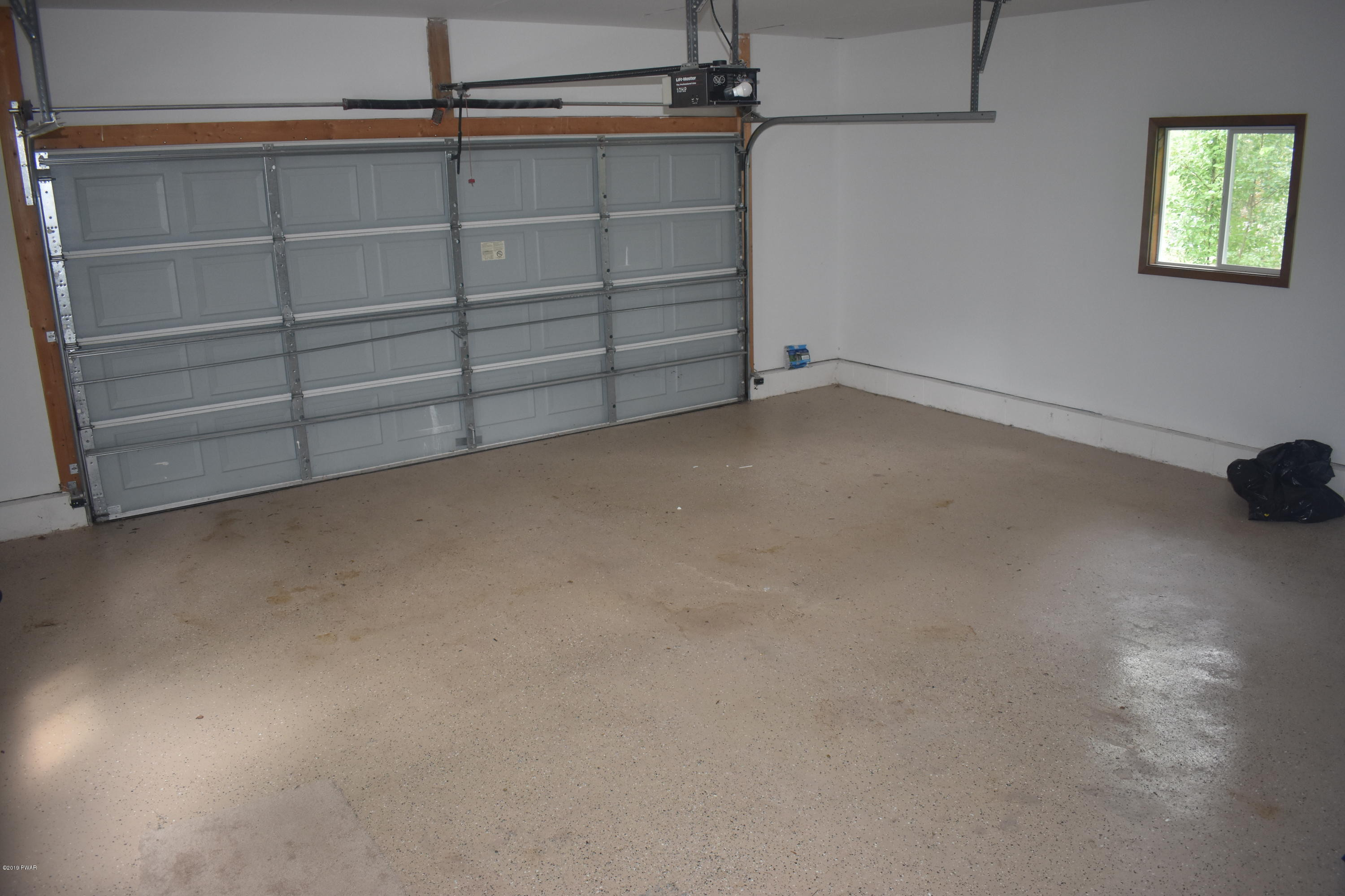 105 Rodeo Drive Hawley, PA 18428 - Photo 18 of 42 a view of an empty room