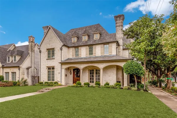 front view of a building with a yard