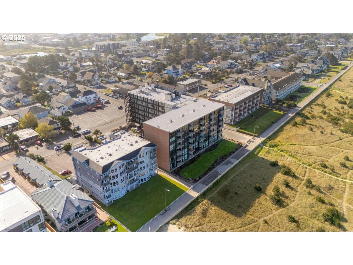 475 South Promenade, Unit 112 Seaside, OR 97138 - Photo 4 of 32 an aerial view of multiple house