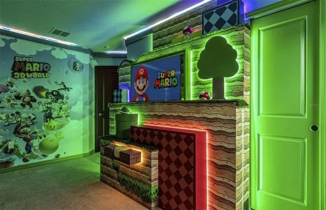 a bedroom with a bed and a couch