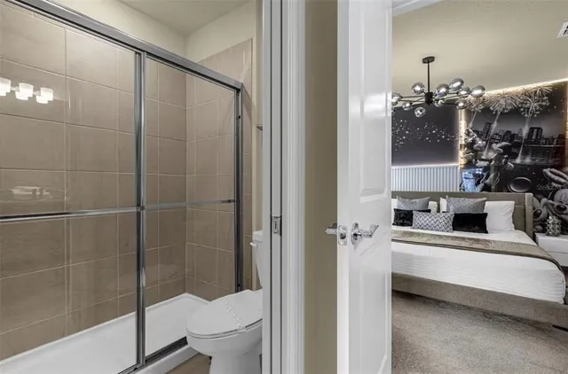 a view of a chairs and table in a backyard