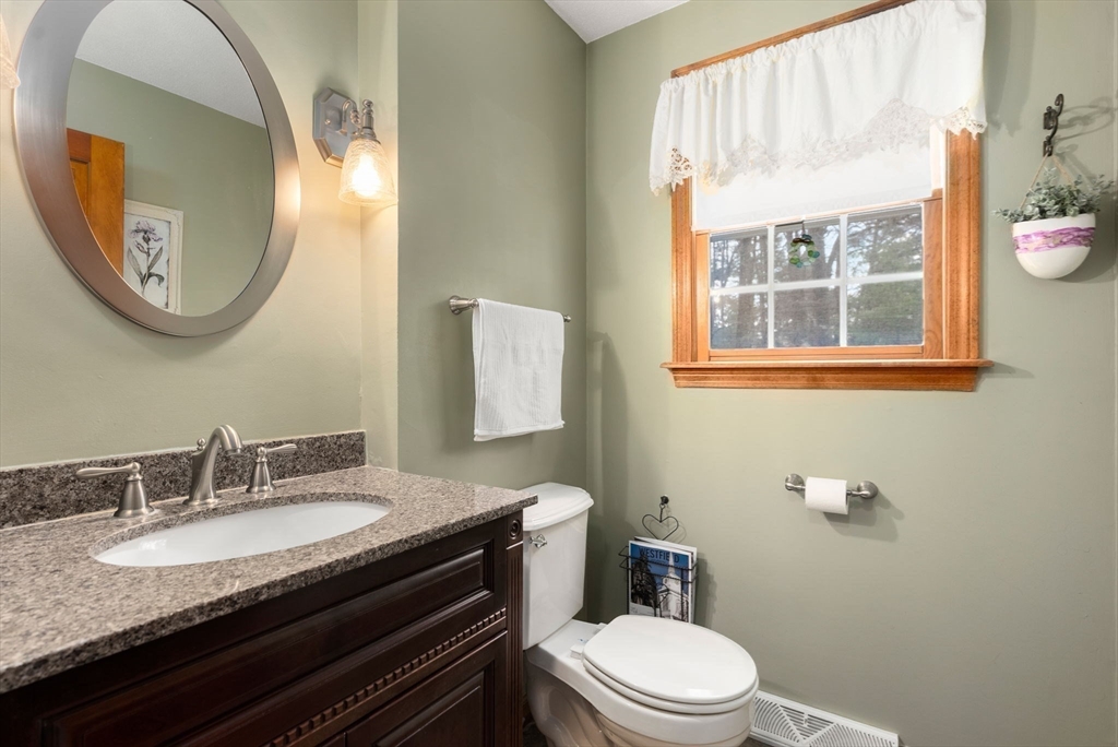 5 Blueberry Ridge Westfield, MA 01085 - Photo 14 of 34 a bathroom with a granite countertop toilet sink and mirror