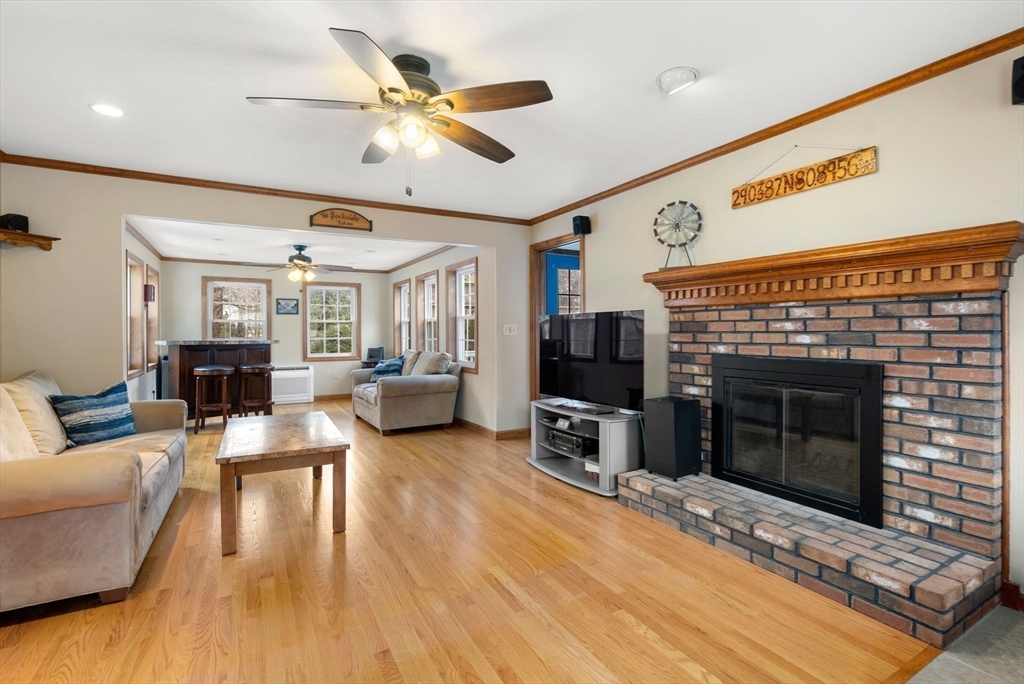 5 Blueberry Ridge Westfield, MA 01085 - Photo 6 of 34 a living room with furniture and a fireplace