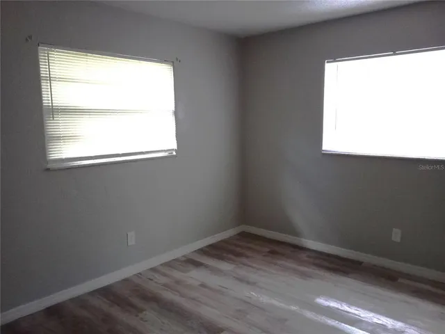 a view of a room that has a window in it