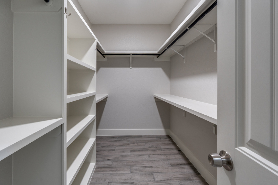 1848 Tanglewood Trail Spring Branch, TX 78070 - Photo 11 of 12 Ample shelving and hanging space defines this well-organized walk-in closet.