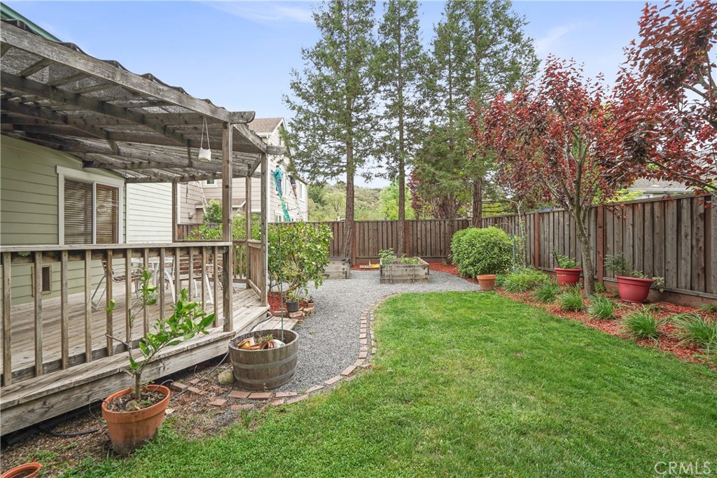 1691 Arbor Way Healdsburg, CA 95448 - Photo 24 of 25 a garden view with a sitting space