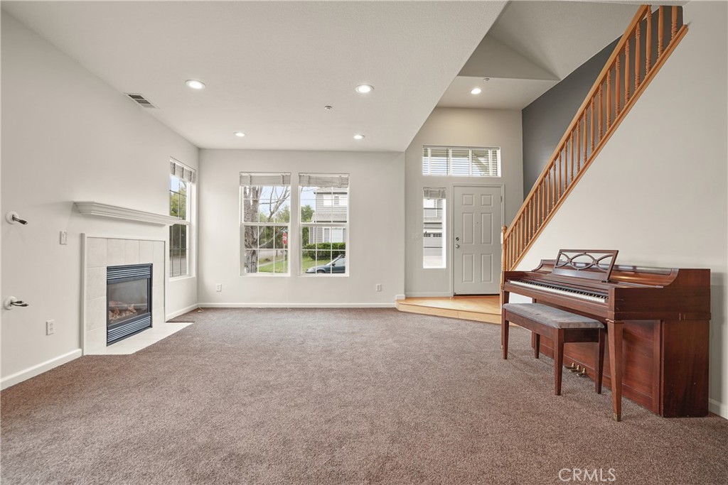 1691 Arbor Way Healdsburg, CA 95448 - Photo 5 of 25 a view of an empty room with a fireplace and a window