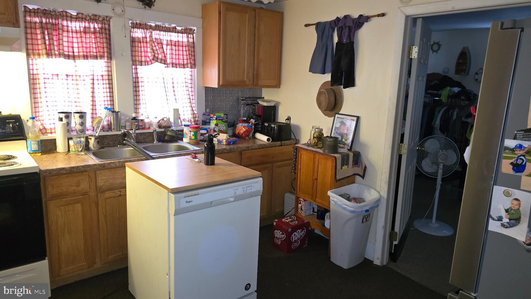 385 Herr Street Lock Haven, PA 17745 - Photo 3 of 13 a view of a kitchen with a sink storage and utility