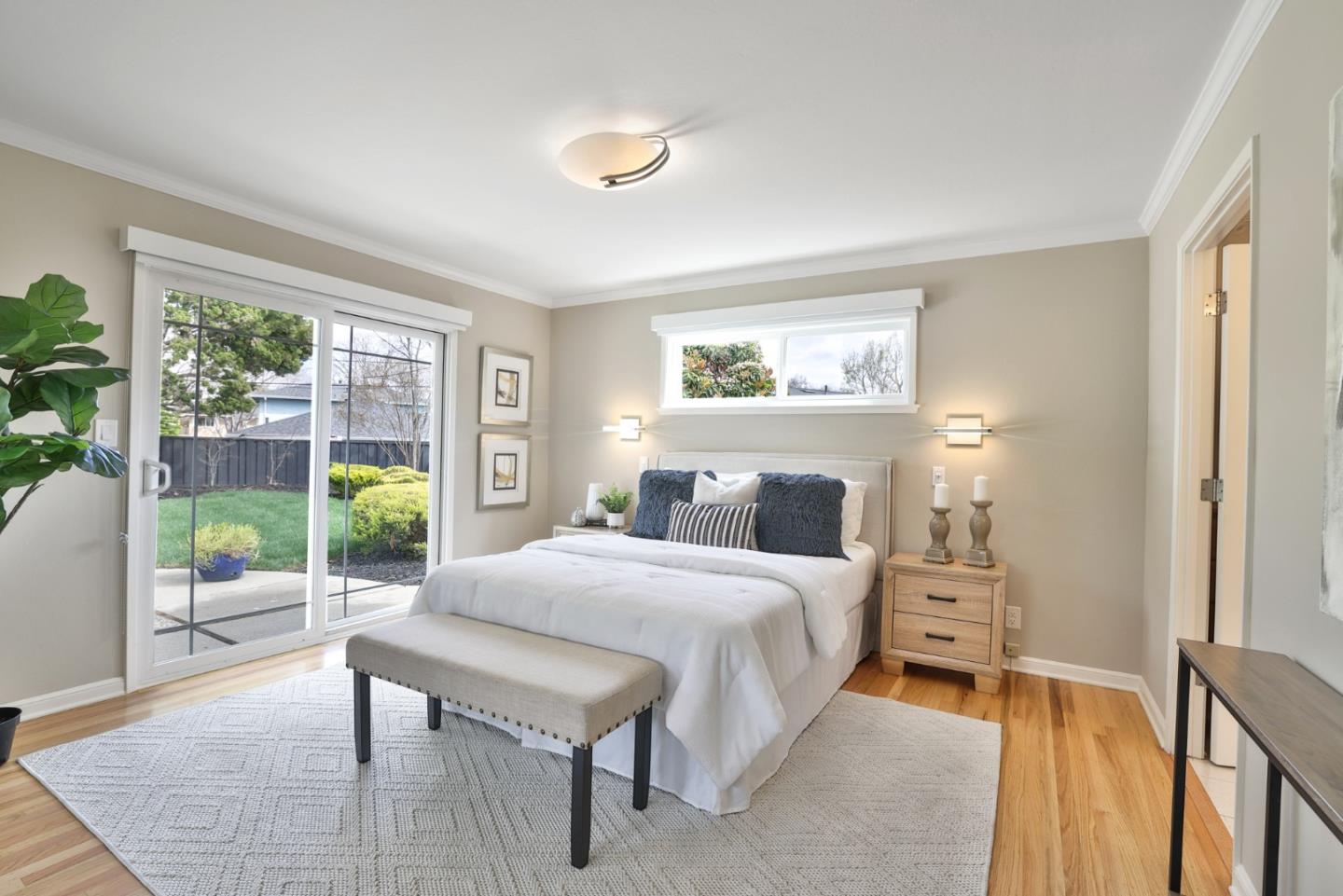 148 Jacinto Way Sunnyvale, CA 94086 - Photo 11 of 27 a bedroom with a bed and a large window