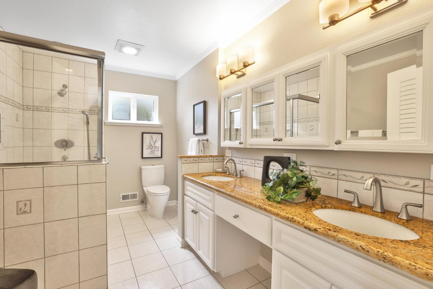 148 Jacinto Way Sunnyvale, CA 94086 - Photo 12 of 27 a spacious bathroom with a granite countertop double vanity sink a mirror and a