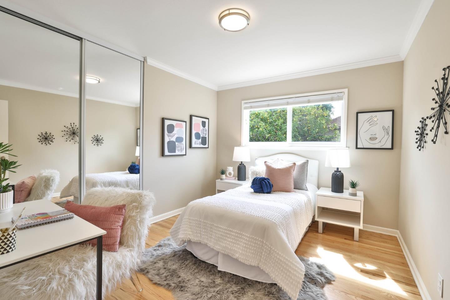 148 Jacinto Way Sunnyvale, CA 94086 - Photo 14 of 27 a bedroom with a large bed and a window