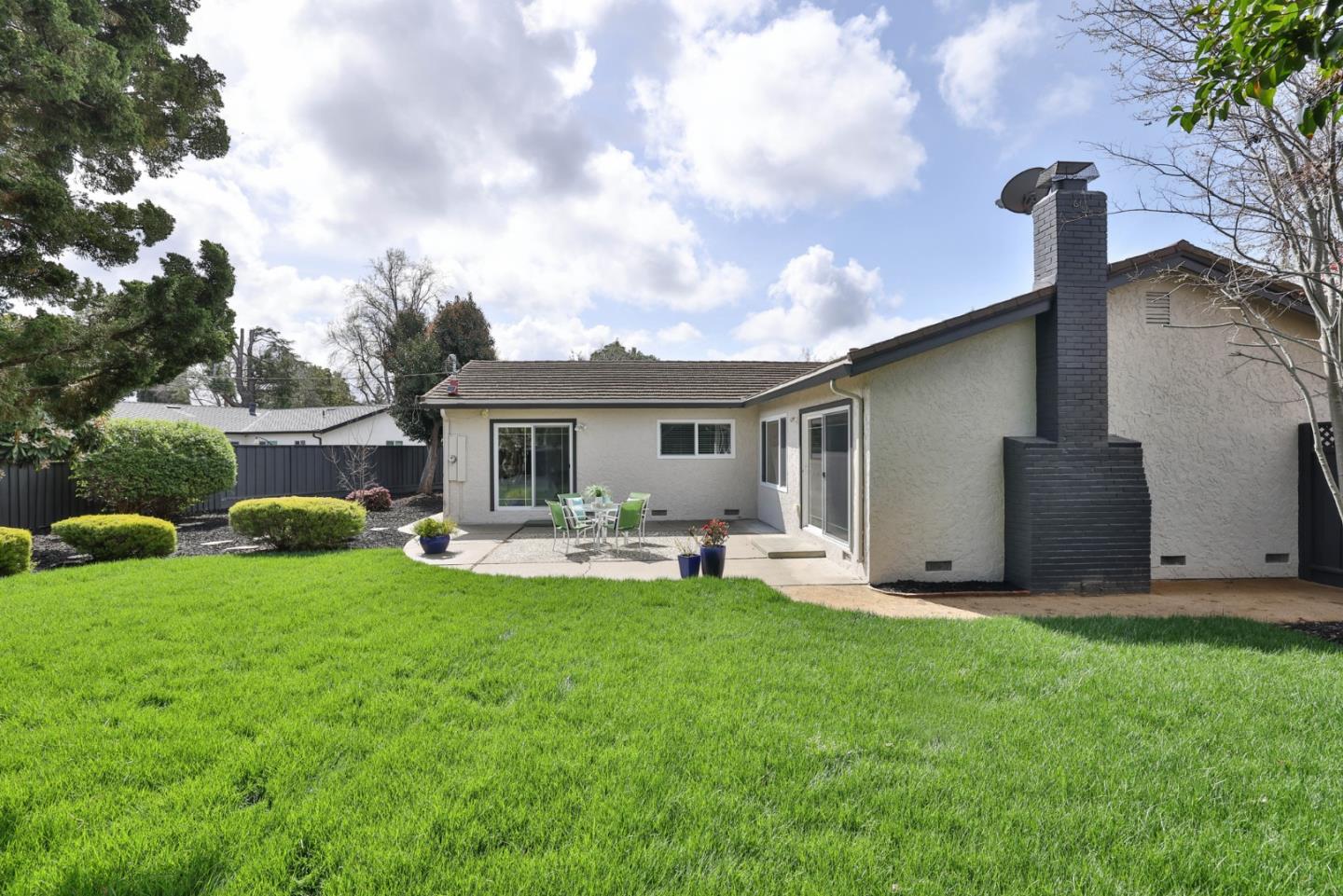 148 Jacinto Way Sunnyvale, CA 94086 - Photo 23 of 27 a front view of a house with garden and yard