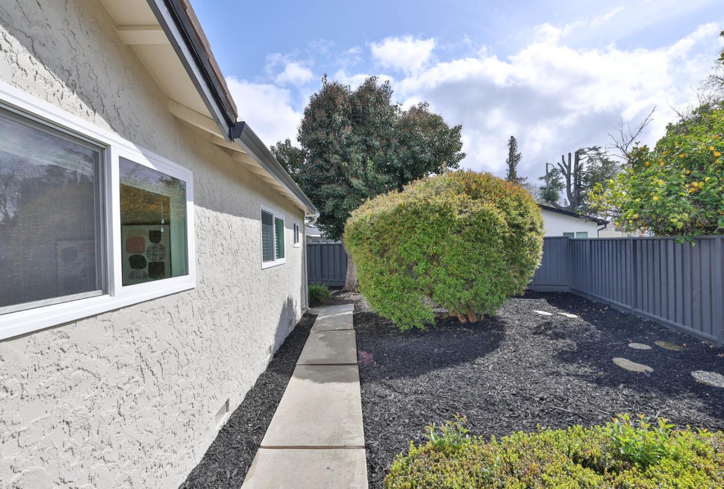 148 Jacinto Way Sunnyvale, CA 94086 - Photo 24 of 27 a view of a backyard with pathway