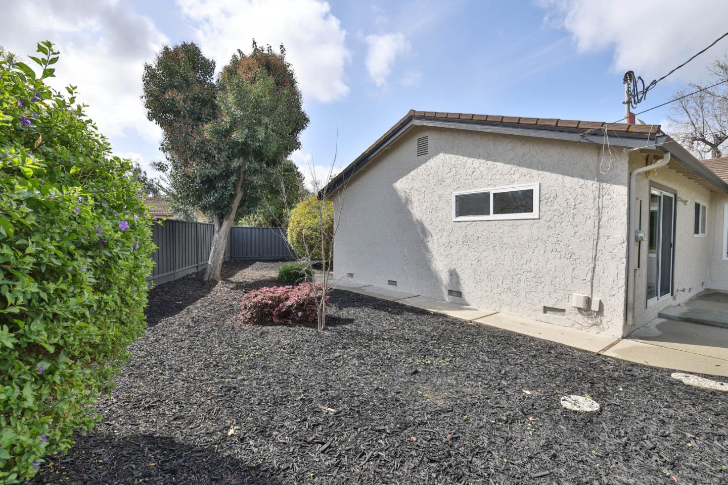 148 Jacinto Way Sunnyvale, CA 94086 - Photo 25 of 27 a view of a house with a yard